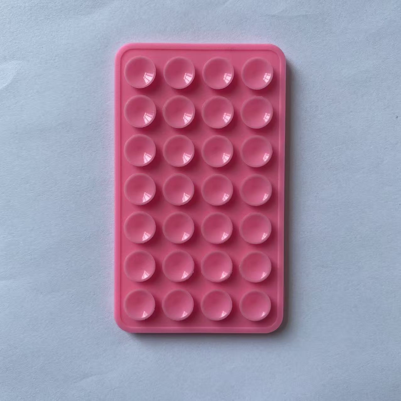 Double-sided silicone suction cup for mobile phone mounting