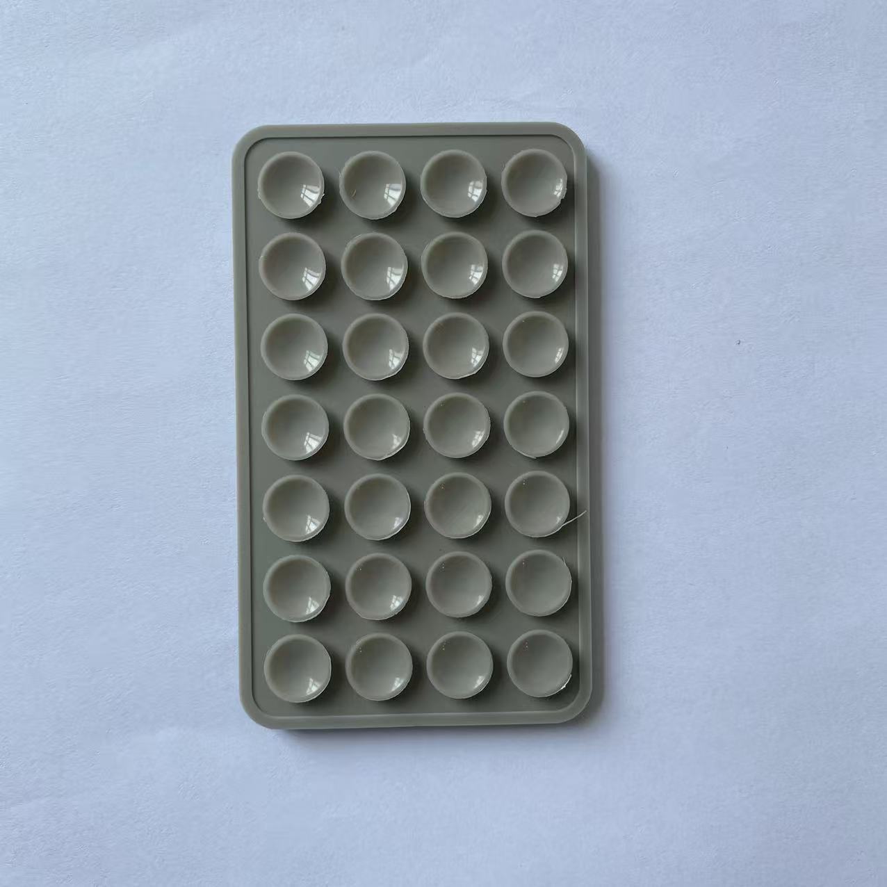 Double-sided silicone suction cup for mobile phone mounting