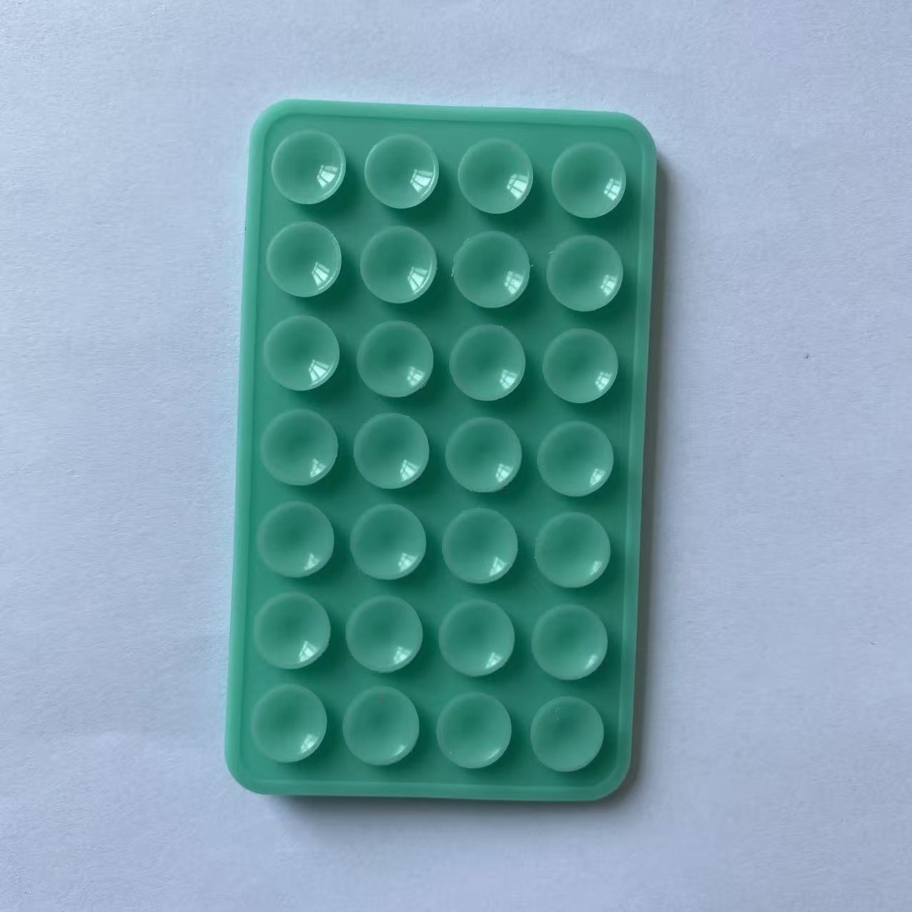 Double-sided silicone suction cup for mobile phone mounting