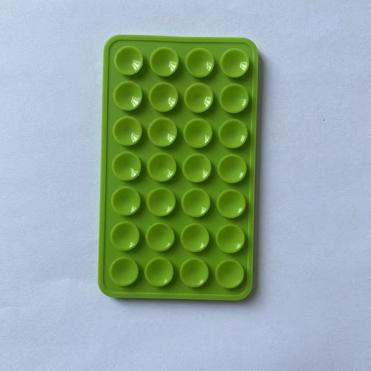 Double-sided silicone suction cup for mobile phone mounting