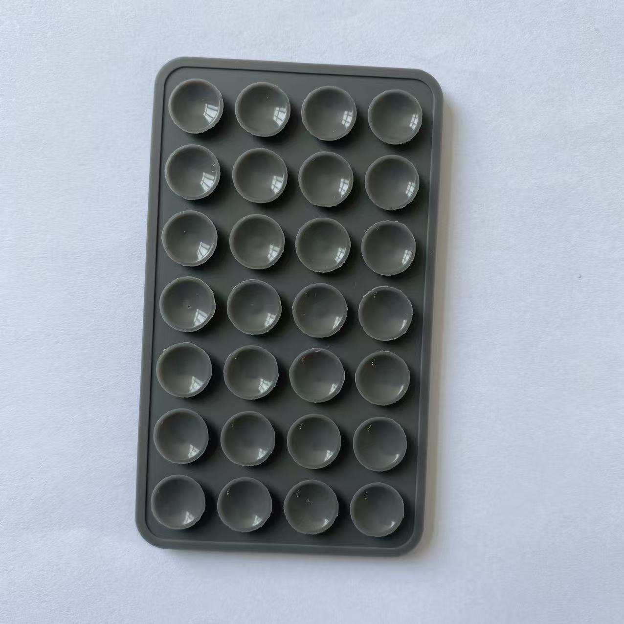 Double-sided silicone suction cup for mobile phone mounting